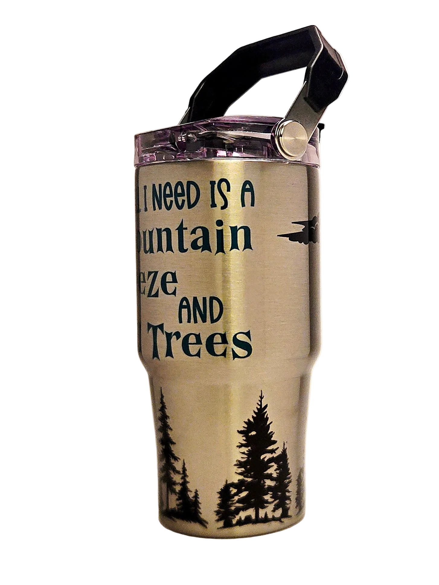 Stainless steel tumbler with text 'I need is a mountain view and trees' on a stainless background
