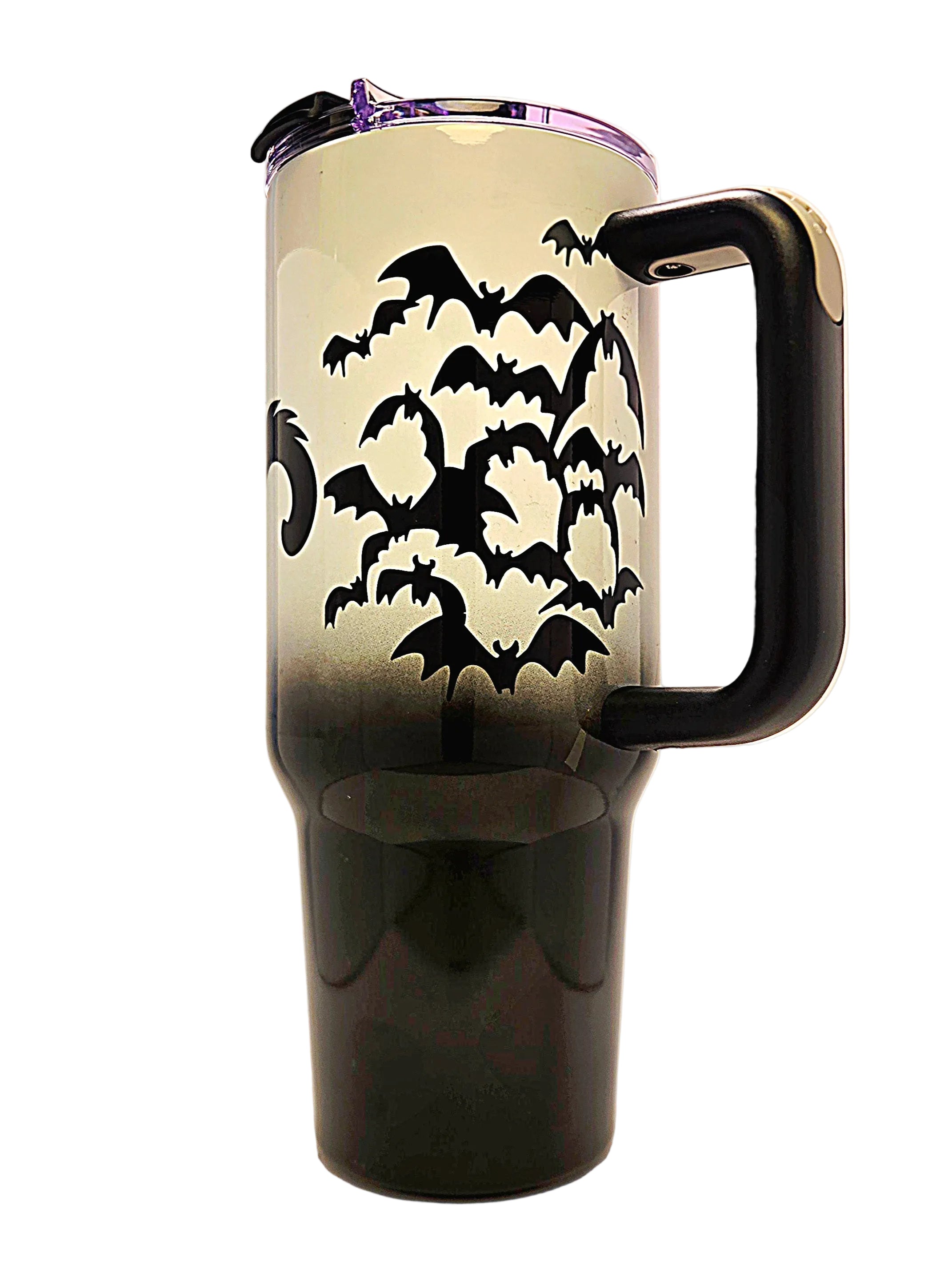 A travel tumbler with a black handle and lid, featuring a black bat silhouette pattern over a white-to-black gradient body, set against a plain light background.