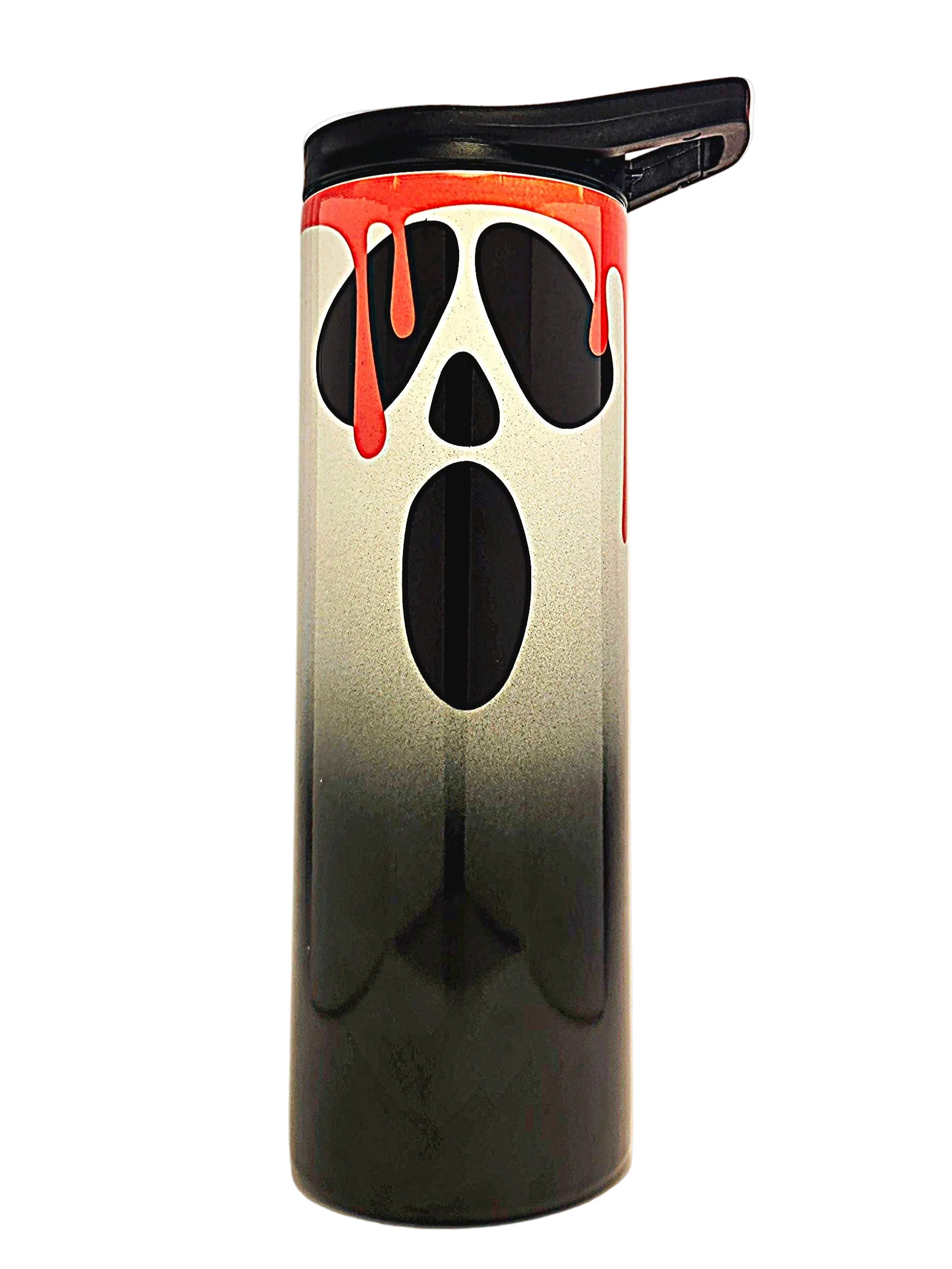 A tall insulated tumbler with a black lid and a ghost face design featuring a black-to-white gradient body and red dripping accents, photographed against a plain light background.