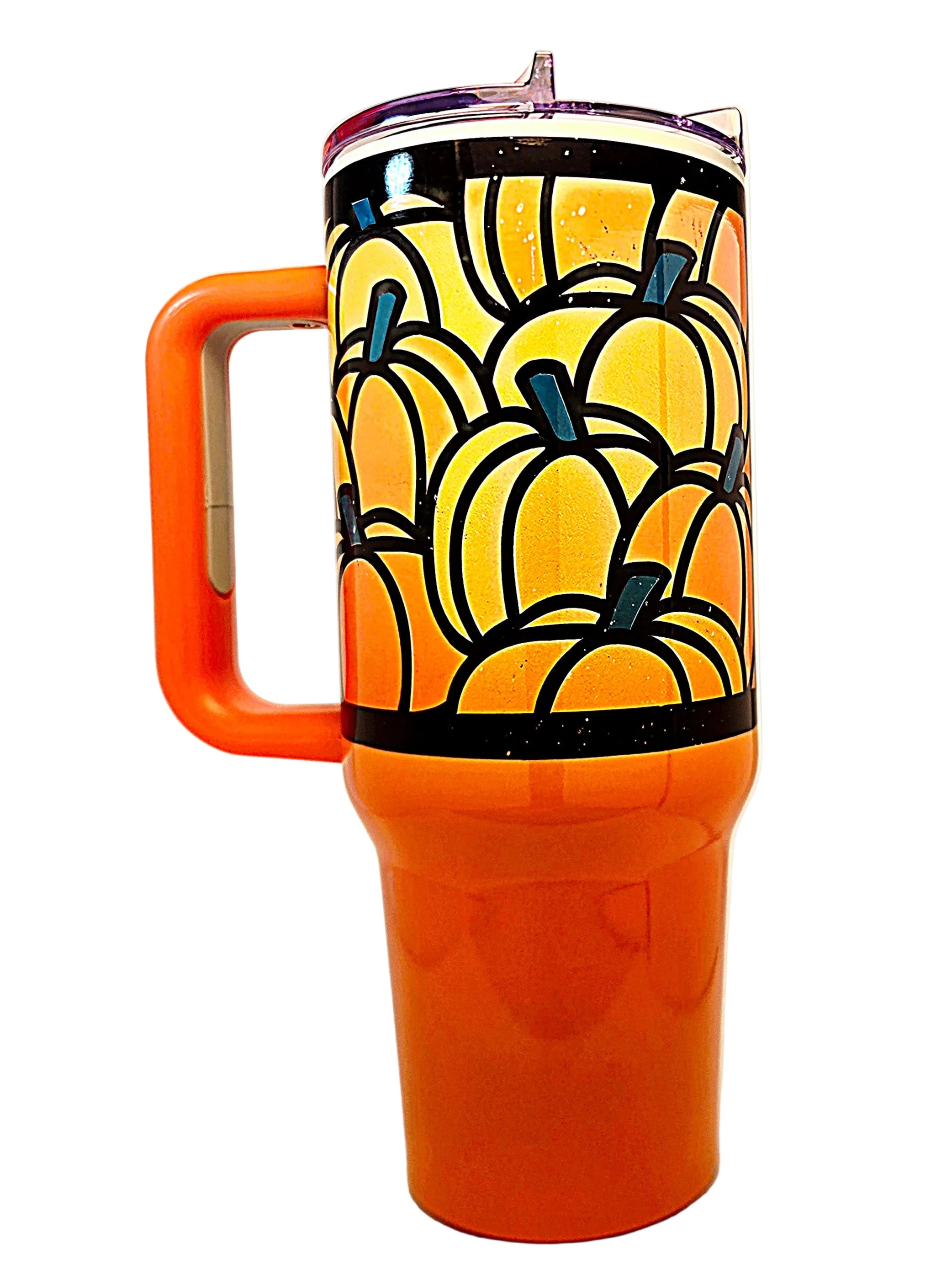 An orange insulated travel tumbler with a handle and clear lid, decorated with a pattern of orange pumpkins outlined in black on the upper half.