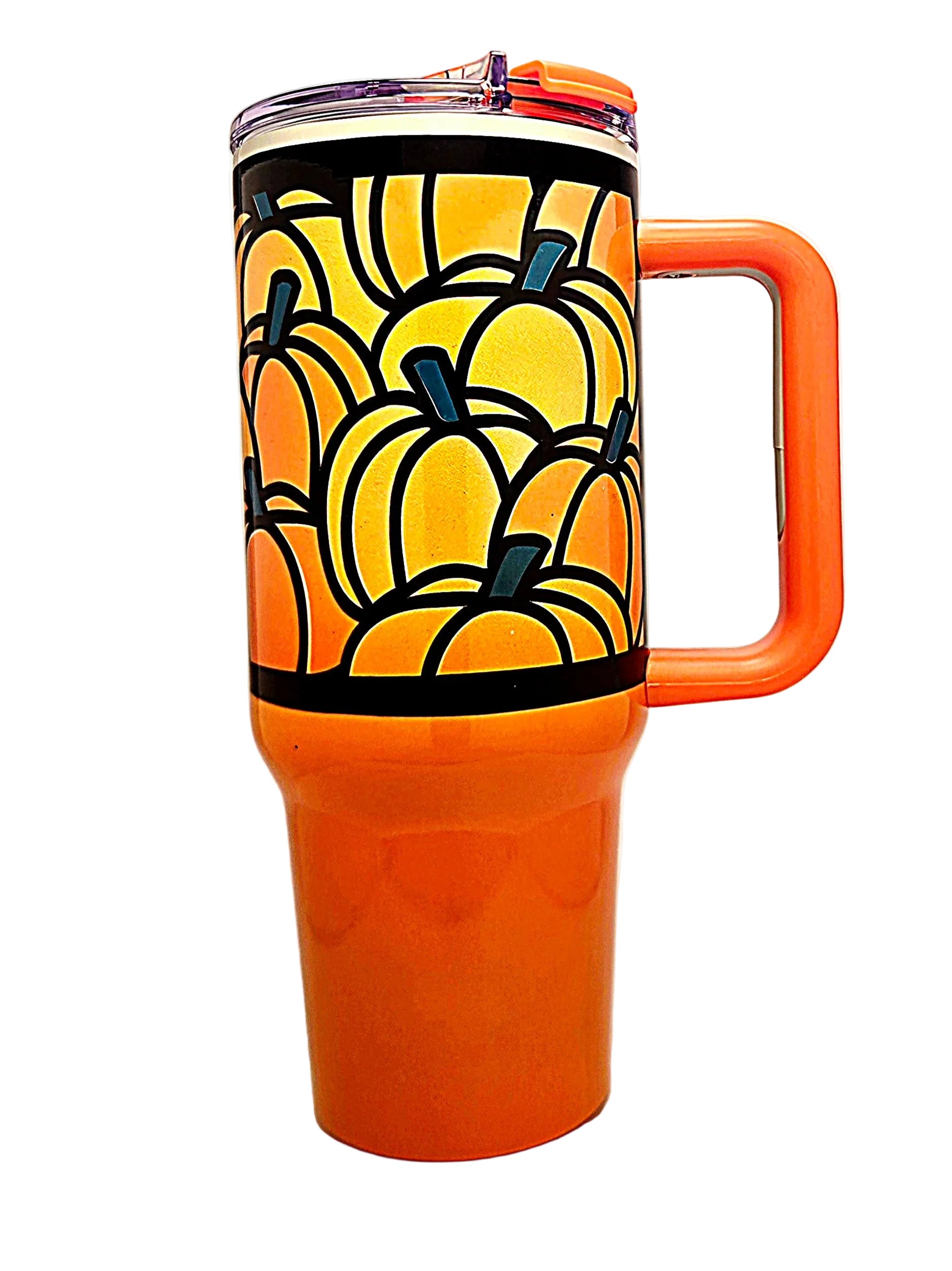 An orange insulated travel tumbler with a handle and clear lid, decorated with a pattern of orange pumpkins on the upper half.