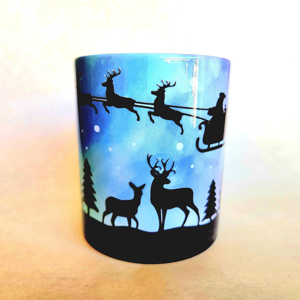 Santa and his sleigh in the Northern Lights 12oz ceramic coffee mug - Coffee Quips Custom Drinkware