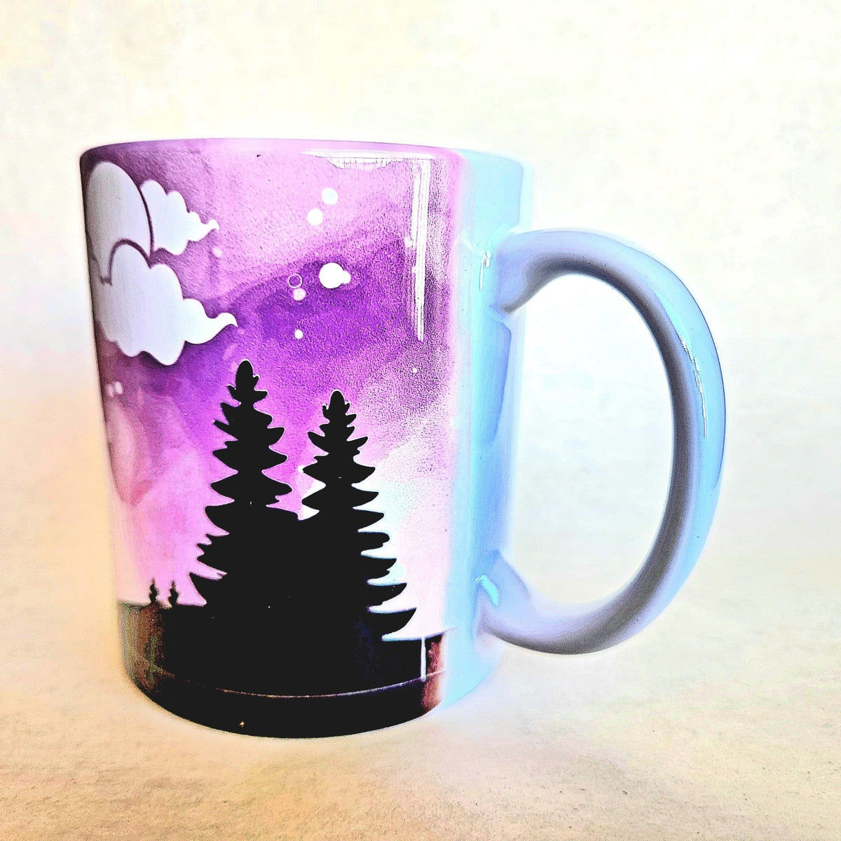 Santa and his sleigh in the Northern Lights 12oz ceramic coffee mug - Coffee Quips Custom Drinkware