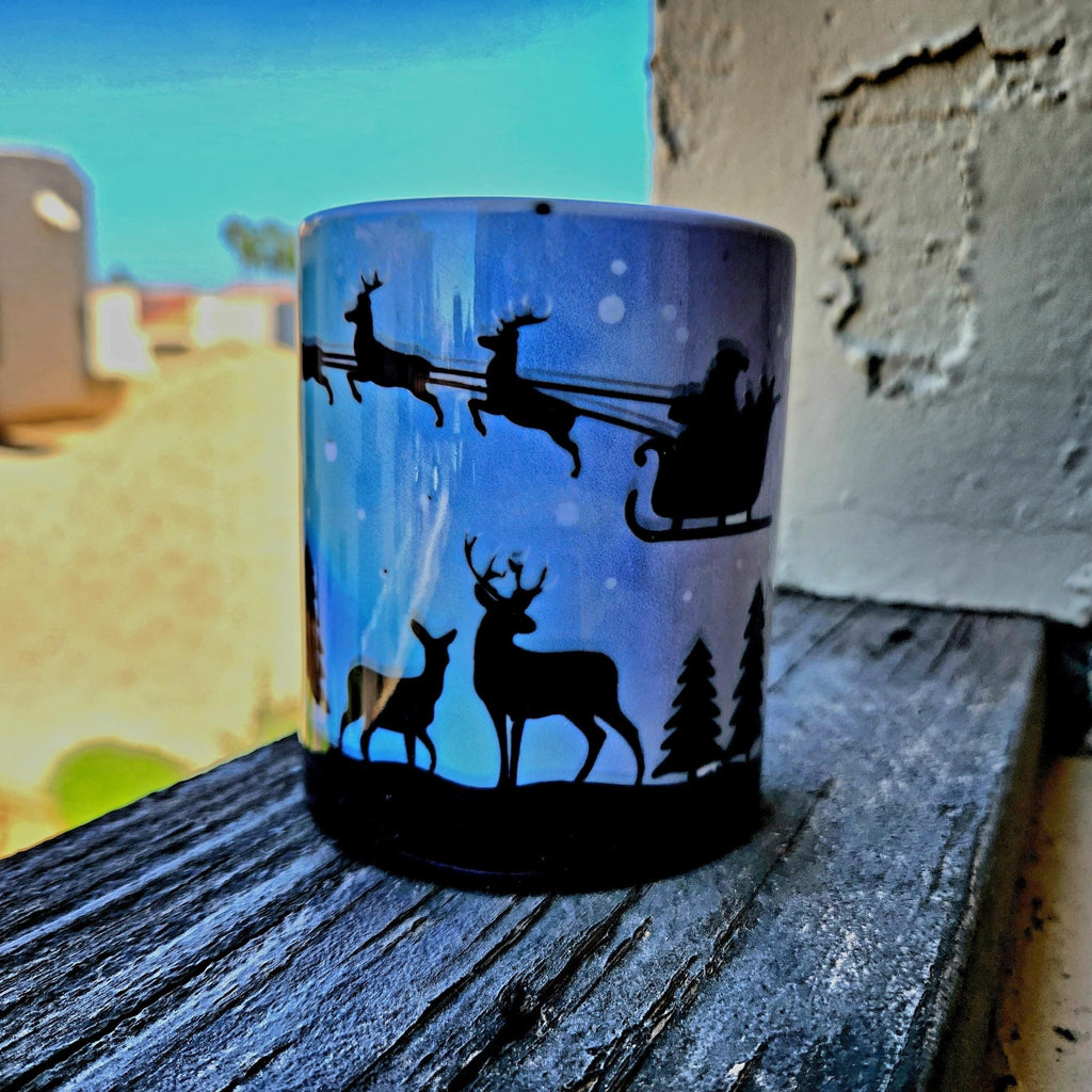 Santa and his sleigh in the Northern Lights 12oz ceramic coffee mug - Coffee Quips Custom Drinkware