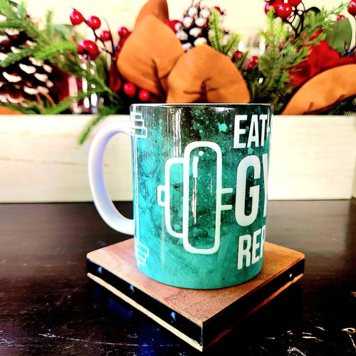12oz Eat Sleep Gym Repeat edition ceramic coffee mug: Fitness Motivation - Coffee Quips Custom Drinkware