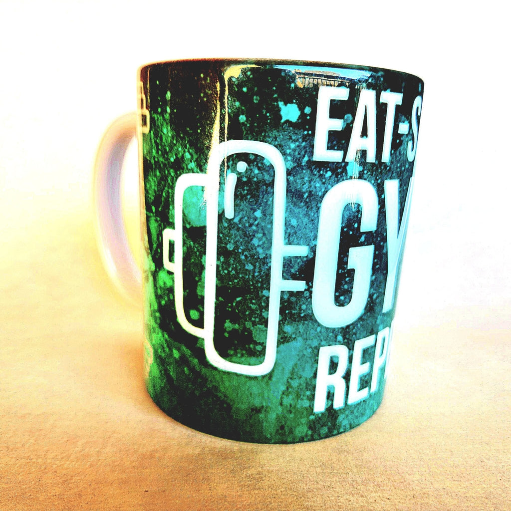 12oz Eat Sleep Gym Repeat edition ceramic coffee mug: Fitness Motivation - Coffee Quips Custom Drinkware