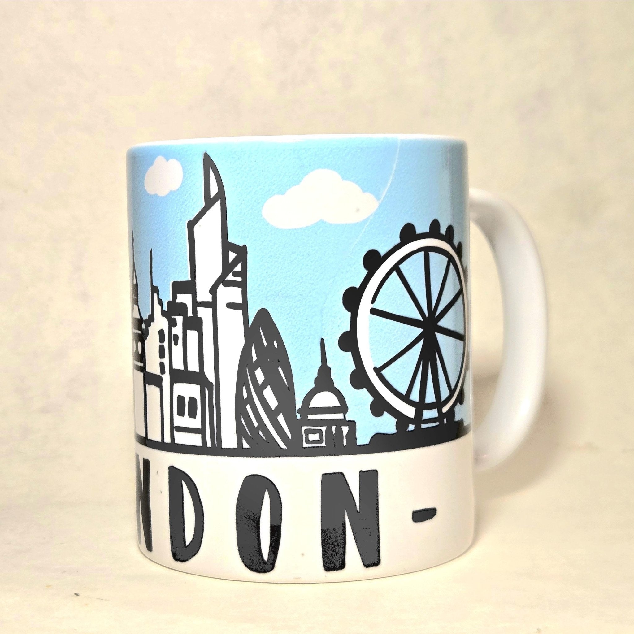 London England Skyline Souvenir Mug. Silhouette of all the Iconic destinations - Coffee Quips Custom Drinkware