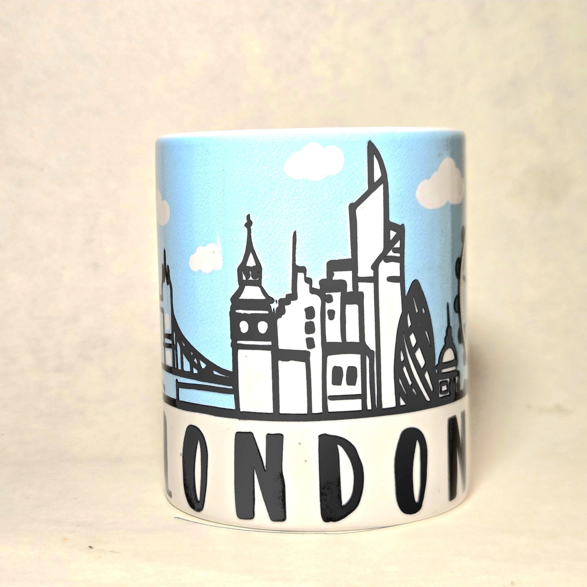 London England Skyline Souvenir Mug. Silhouette of all the Iconic destinations - Coffee Quips Custom Drinkware